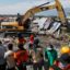 Bodies of mother clutching baby found as Indonesia quake toll rises above 1,500