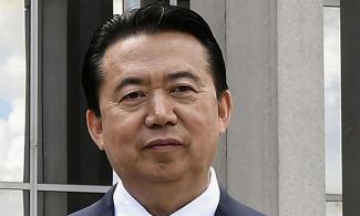 China confirms detention of Interpol chief